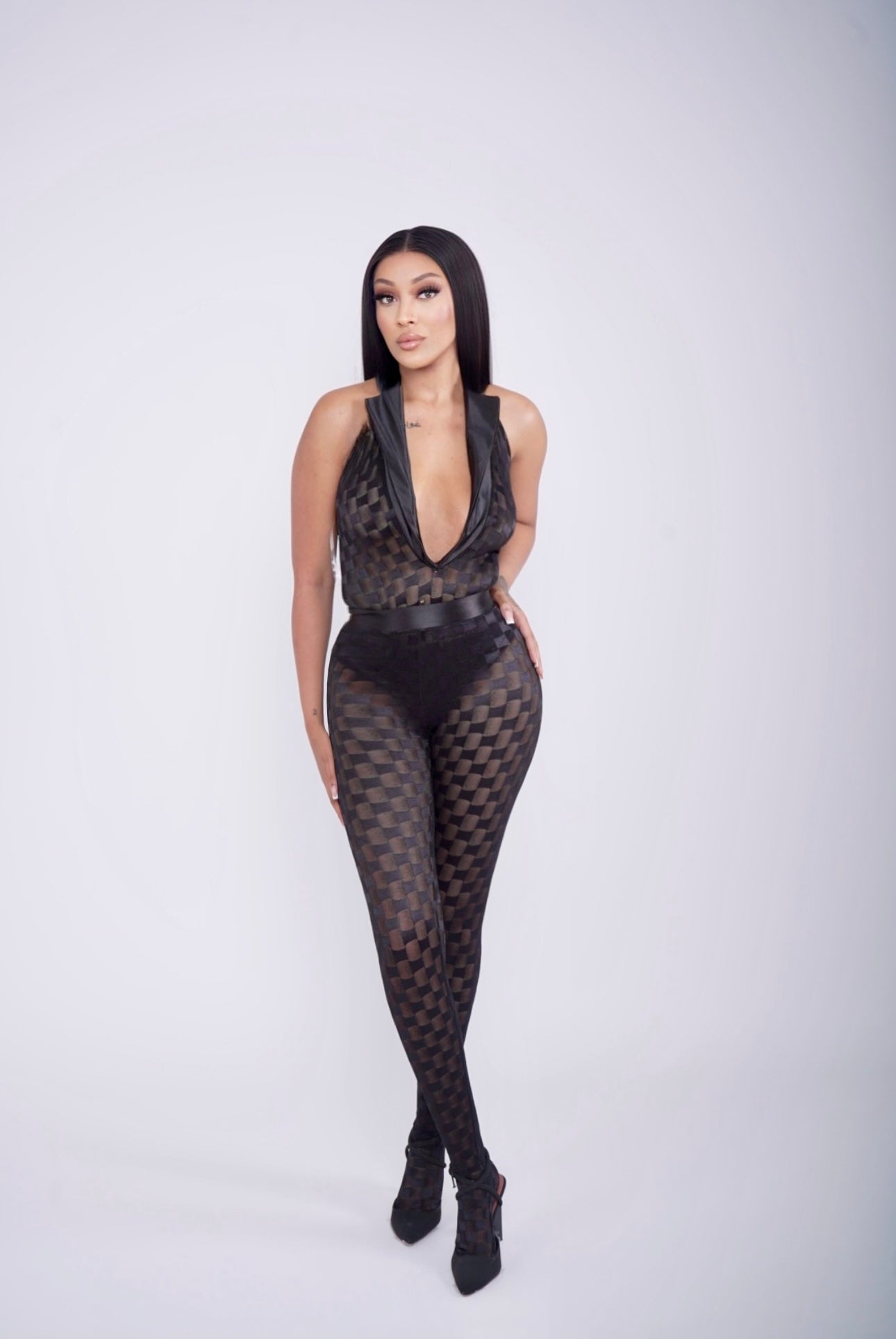Sultry and Sophisticated Deep Plunge Mesh Jumpsuit